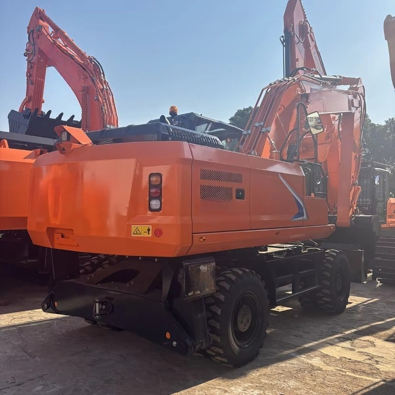 Durable Wheel Mounted Excavato - مراجعة Heavy Equipment Work وسعره
