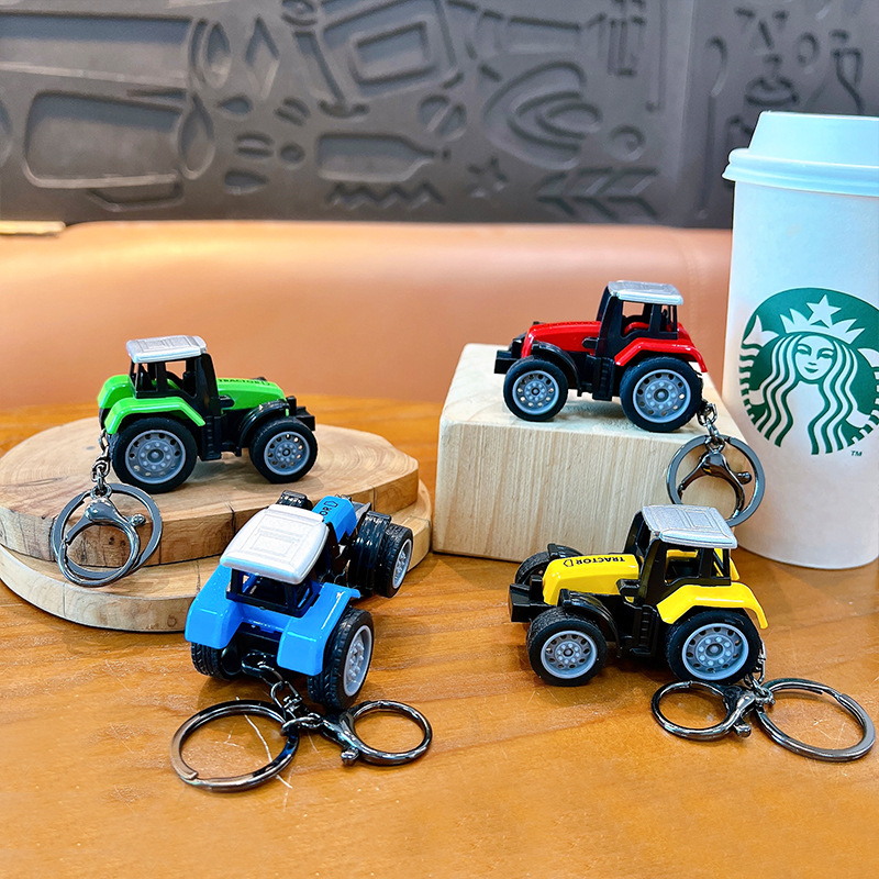 Model Simulation Mini Car Trac - مراجعة Heavy Equipment Key Ring وسعره